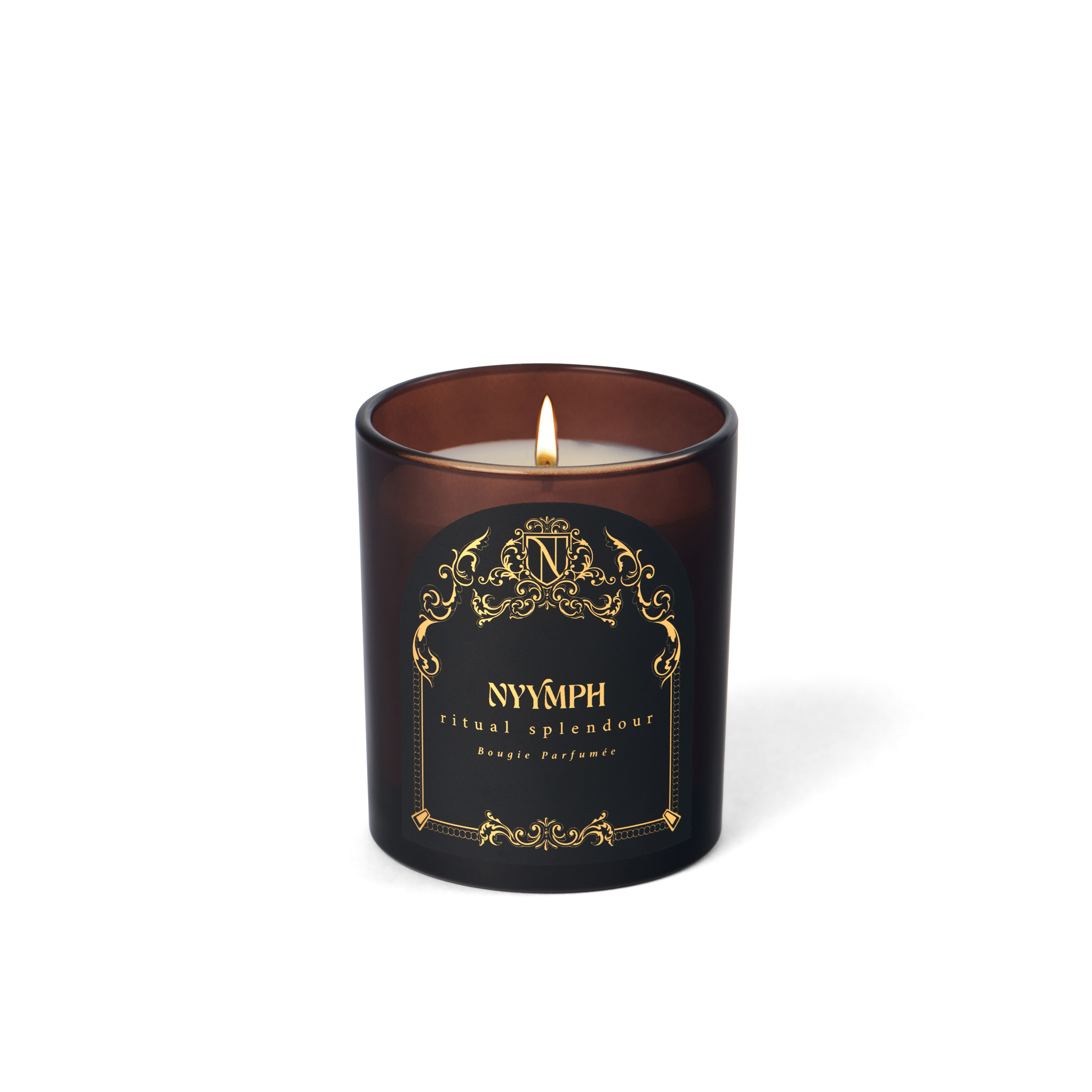 Ritual Splendour candle by NYYMPH – soy-coconut wax in gold-detailed maroon glass, lit and centered on transparent background for ecommerce.